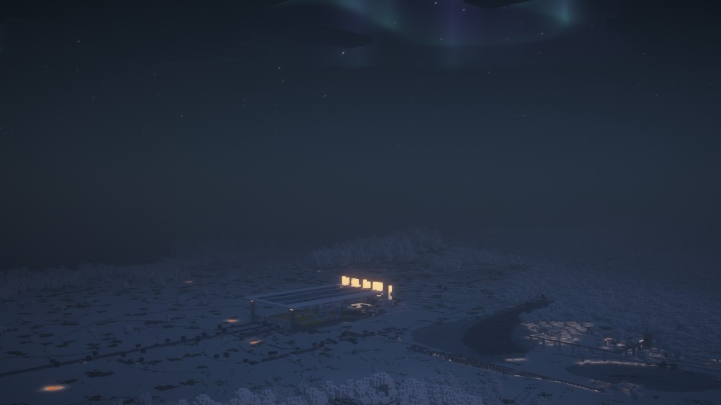 Night aerial view of a snow-covered Minecraft world with a brightly lit train station and aurora in the sky.